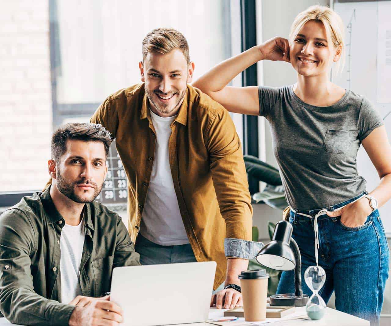 group of young managers working with laptop togeth 2023 11 27 05 07 34 73SRNLU 1